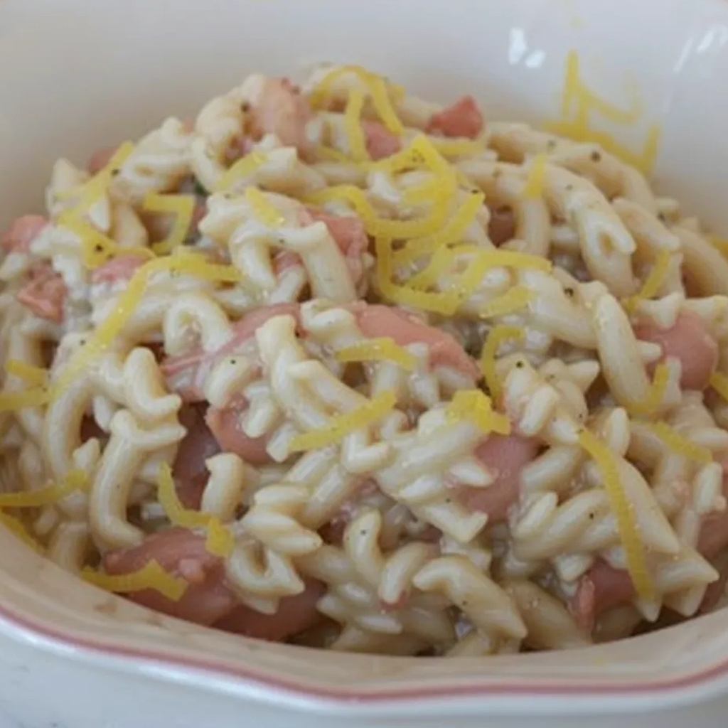 Ricetta Risotto Prosciutto e Limone: un Primo Piatto Cremoso e Profumato 1 foodblog 1749272562 crop