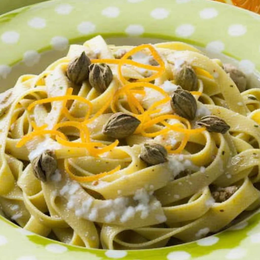 Ricetta Tagliatelle all'Arancia: Un Primo Piatto Agrumato e Delizioso! 1 foodblog 1749274883 crop